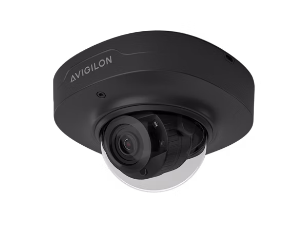 A black Avigilon Alta A5 Compact Dome camera mounted to a white ceiling, featuring a clear glass dome and a high-definition adjustable lens.