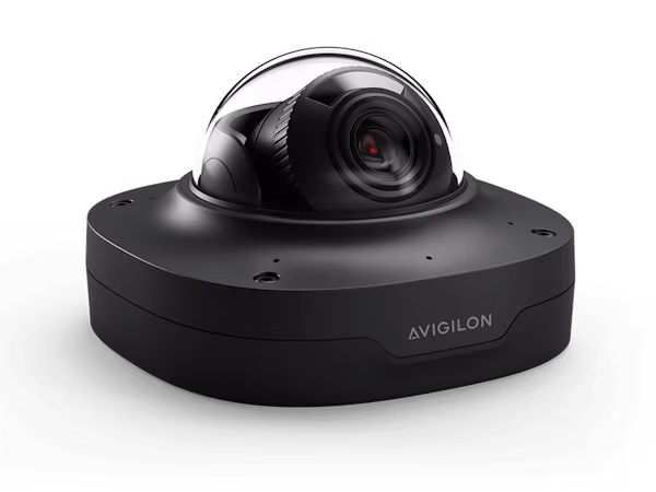 A close-up, angled view of a black Avigilon Alta H5 Dome security camera with a clear protective dome and visible internal lens.
