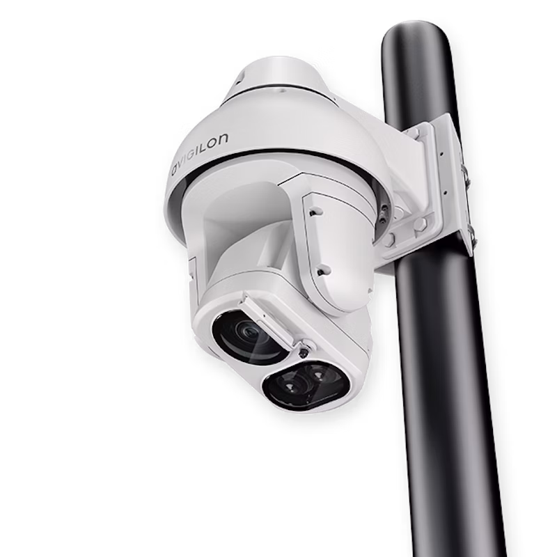An Avigilon H5A IR PTZ security camera mounted securely to a black metal pole using a specialized bracket.