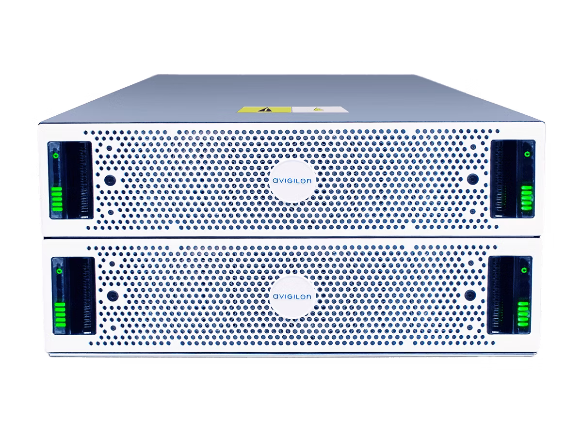Front view of two stacked Avigilon Video Archive storage servers featuring white perforated bezels, central Avigilon logos, and illuminated green LED status lights on the side handles.