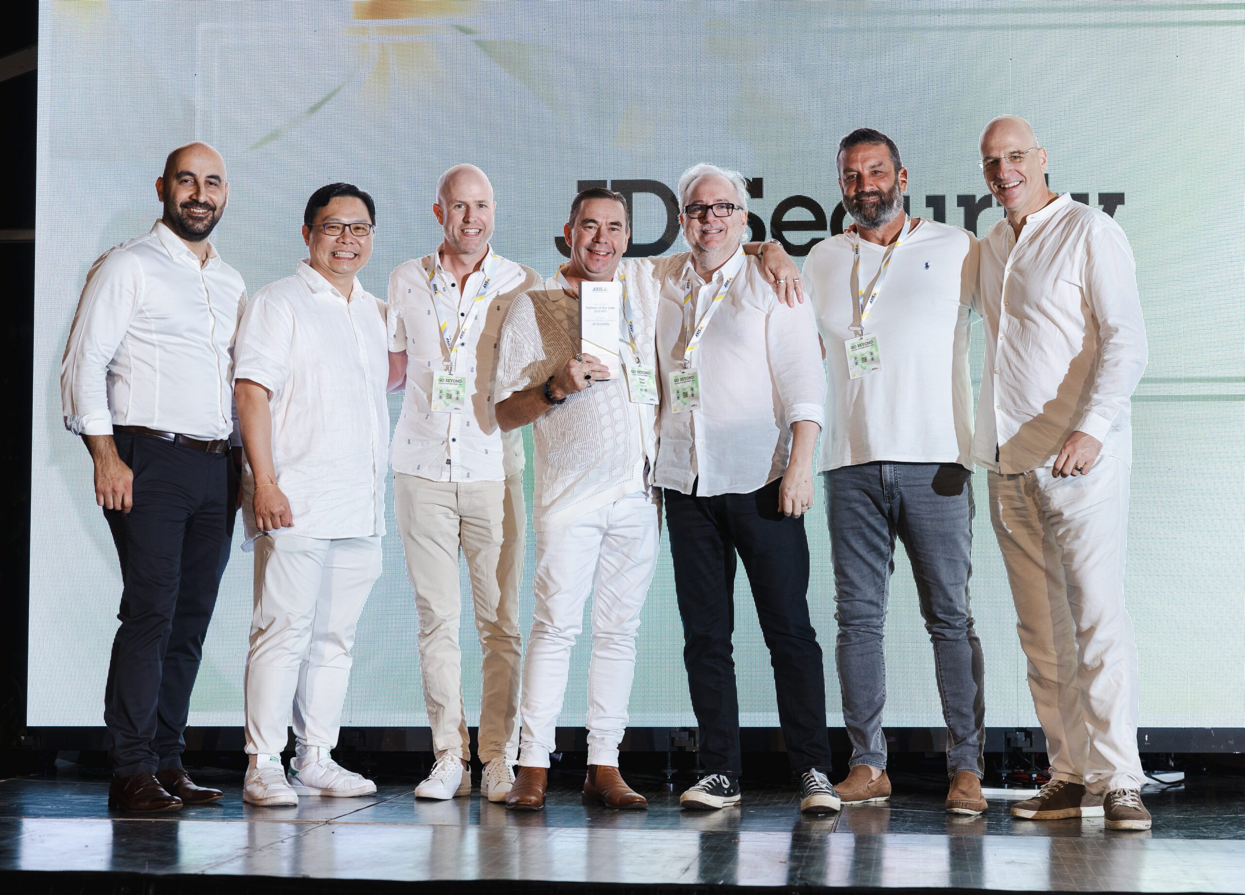 JD Security team accepting the AXIS Communications NSW Partner of the Year 2023 award on stage